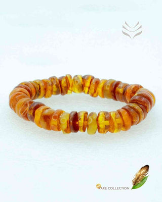 Light-coded yellow amber bracelet on display.