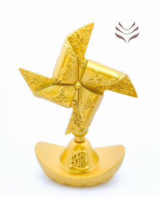 Light-coded golden feng shui fan with detailed engravings, mounted on a gold ingot base for enhancing windfall luck.