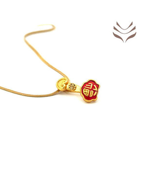 Side view of the Ru-Yi Stick Pendant featuring a gold finish and red detailing, ideal for enhancing leadership and respect.