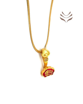 Close-up of the Ru-Yi Stick Pendant showcasing its elegant gold craftsmanship and Feng Shui-inspired red accents.