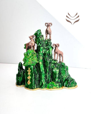 Fortune & Family 3 Sheep feng shui sculpture with three sheep atop a vibrant green mountain, symbolizing wealth and generational harmony.