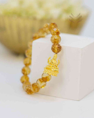 Citrine crystal Lakshmi bracelet on display