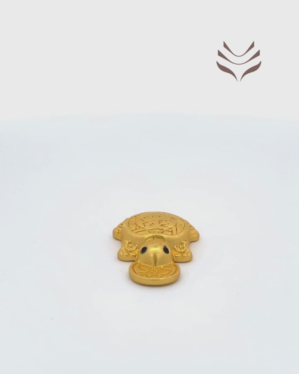 Flat view of the Light-Coded Pocket Tortoise showcasing its detailed feng shui engravings for prosperity and longevity.